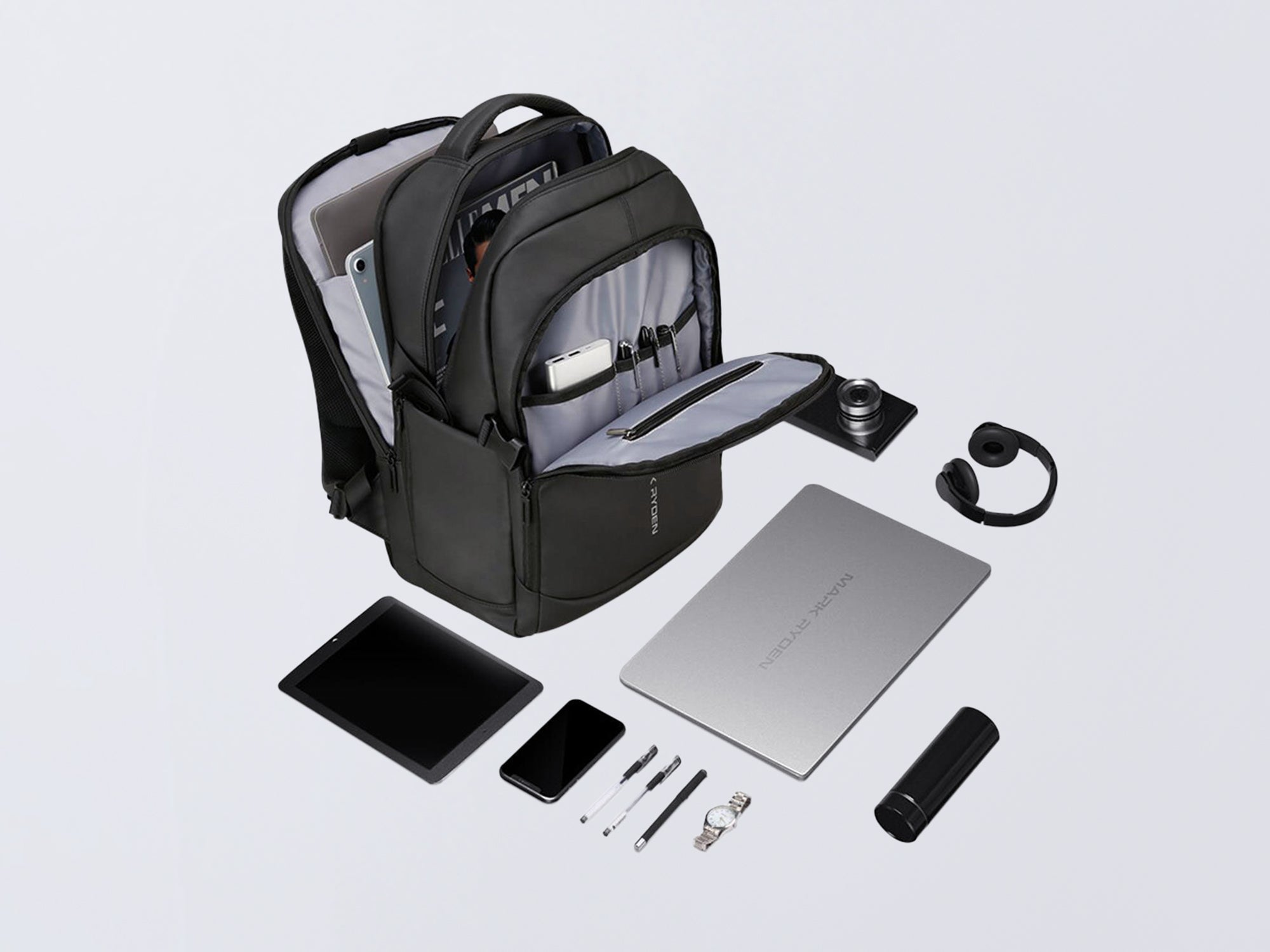 Mark Ryden black anti-theft laptop backpack with organized compartments, holding laptop, tablet & travel accessories