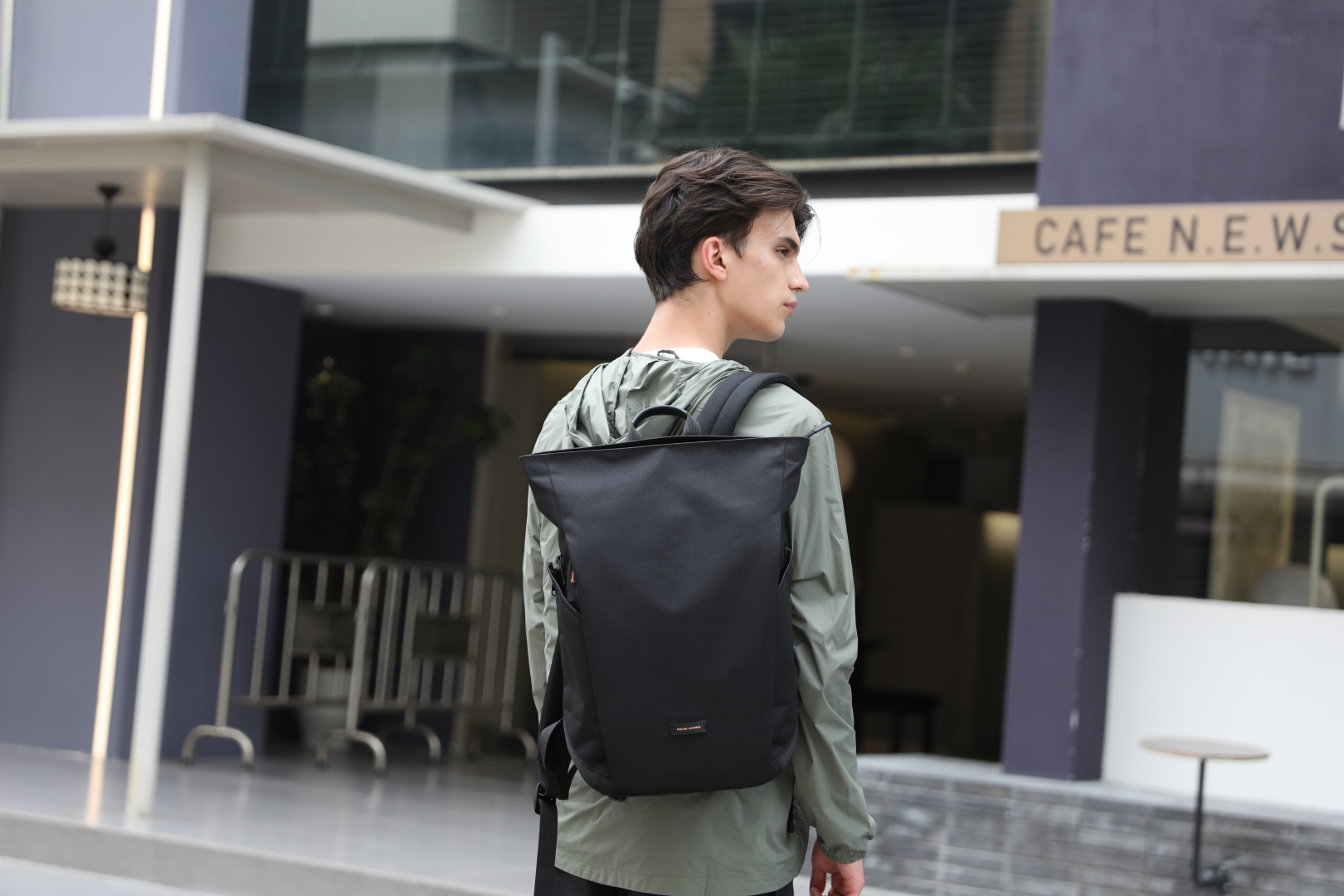 Mark Ryden Global men's black anti-theft backpack in urban setting