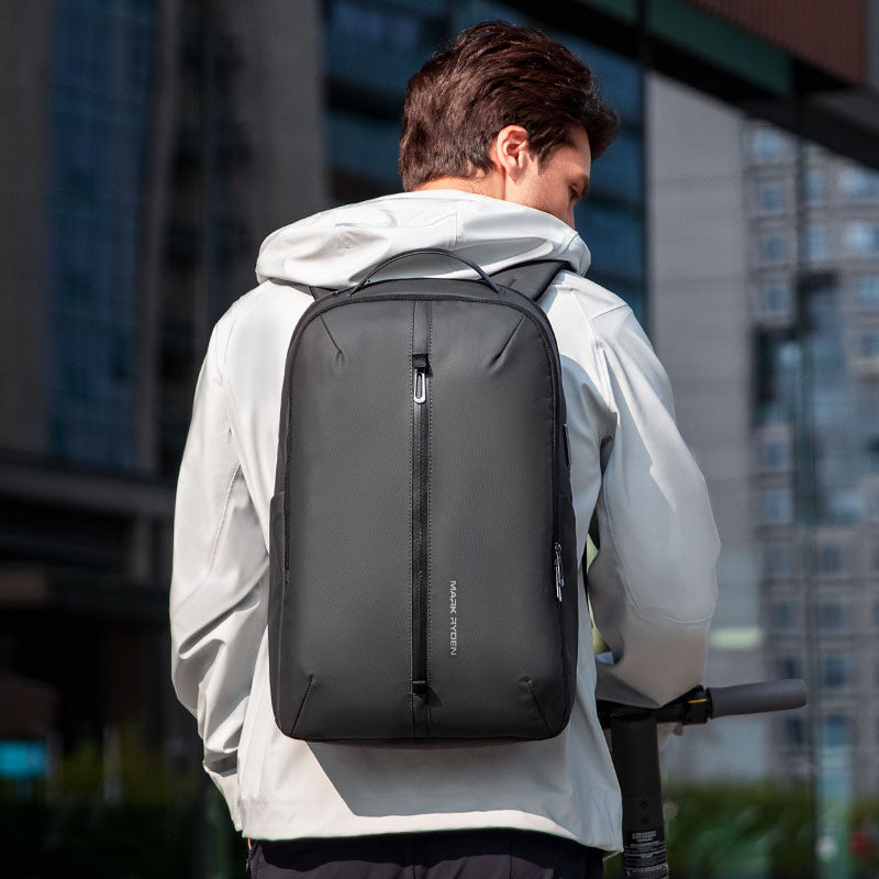 MarkRydenGlobal black waterproof scratch-resistant backpack on man in city