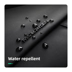 Black textured MARK RYDEN UrbanStride Compact City Explorer’s Satchel Crossbody Bag with water droplets demonstrating water repellent feature.