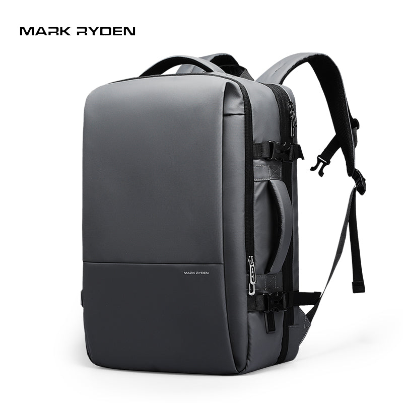 Gray Mark Ryden 40L backpack with three-layer main pocket, designed for business trips, travel, and college use, featuring multiple compartments and adjustable straps.
