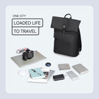 Mark Ryden Global black roll-top minimalist backpack with travel essentials, loaded life to travel