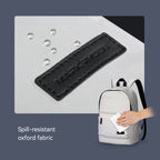 MarkRyden gray daily backpack with black branded patch, spill-resistant oxford fabric
