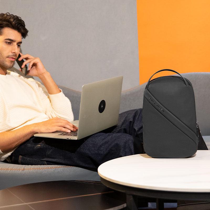 Mark Ryden Global dark gray waterproof large capacity crossbody bag near laptop user