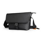 Black business casual crossbody bag with buckle closure by Mark Ryden Global