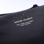 Mark Ryden black sling bag with logo and text detail