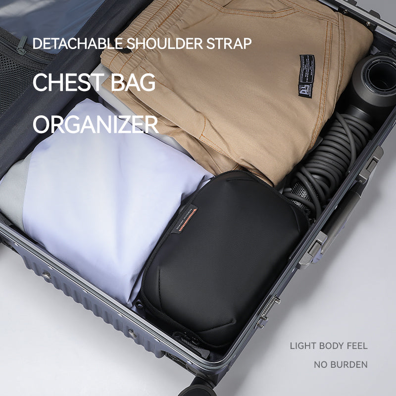 Mark Ryden Global luggage with chest bag, beige pants, and travel accessories