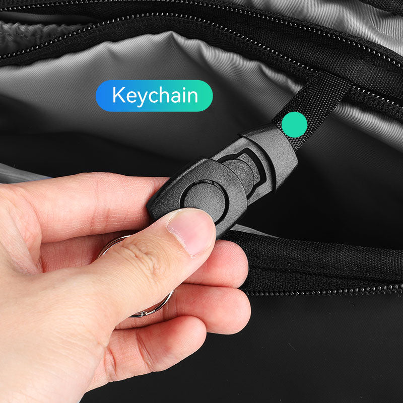 MarkRyden Global's Harvey leather waterproof messenger bag with keychain attachment detail