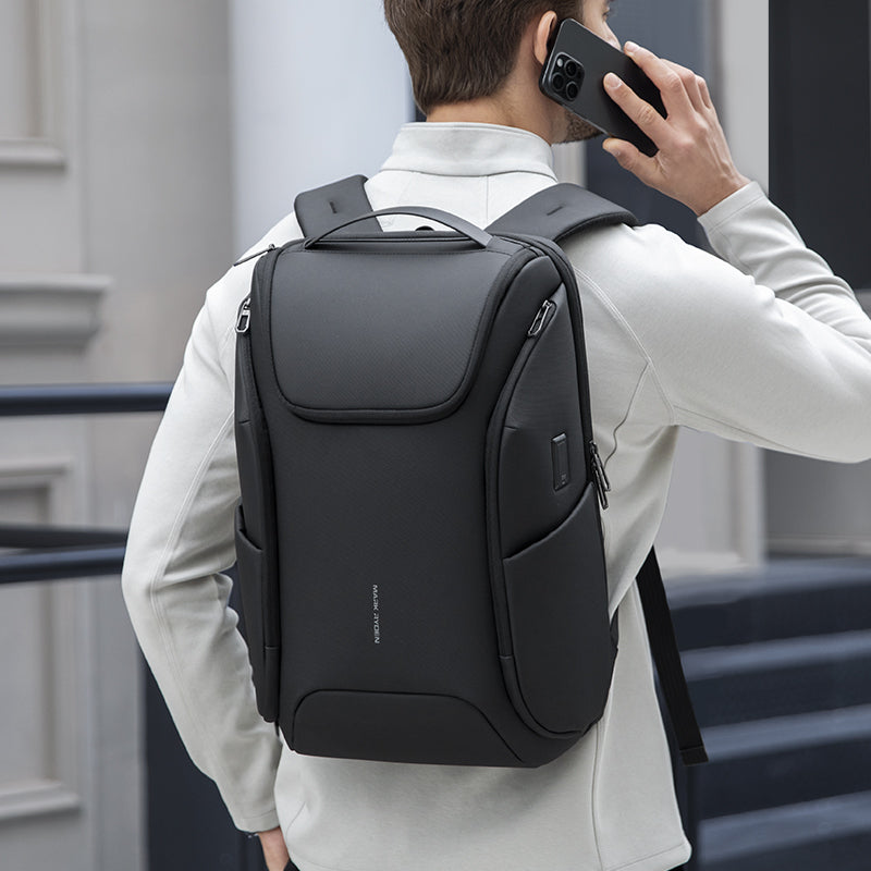 Mark Ryden Global waterproof backpack with built-in USB for traveling - sleek black design