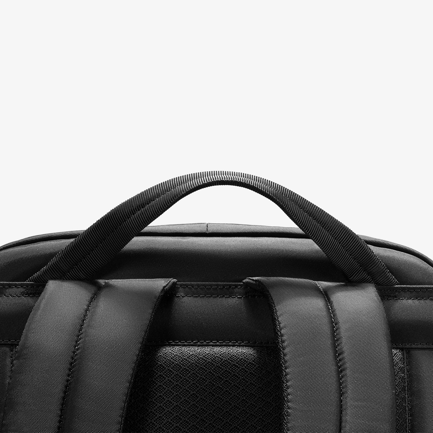 Mark Ryden Global's black splash-proof commuter backpack with sturdy handle