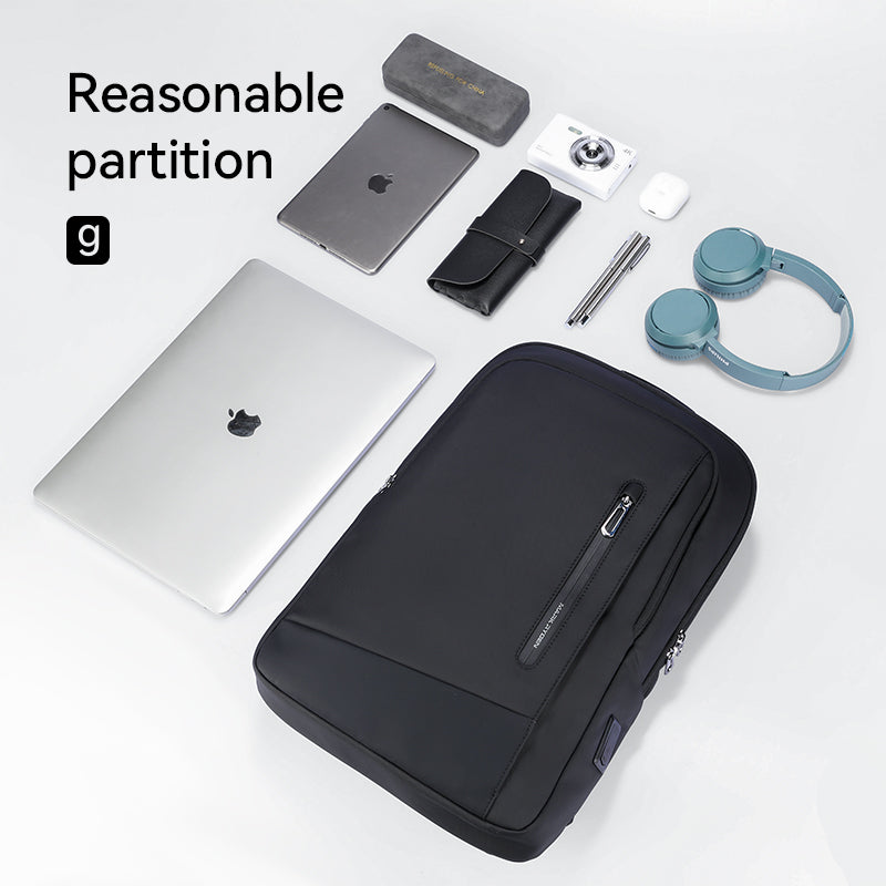 Black UrbanLite Pro business travel backpack with front zip pocket, surrounded by laptop, tablet, headphones, wallet, and pens, highlighting reasonable internal partition.