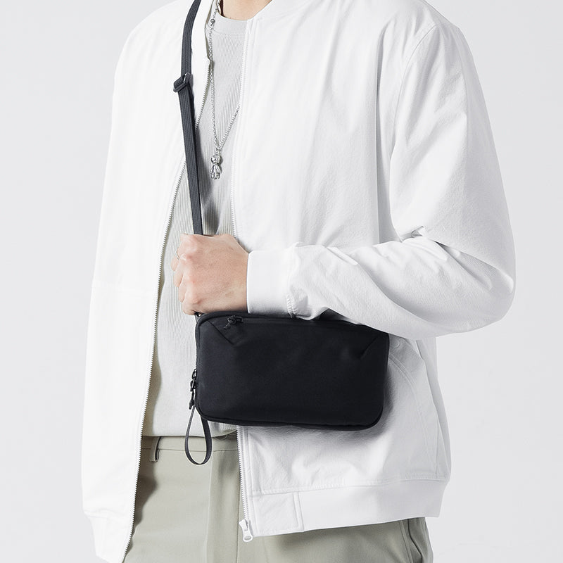 Mark Ryden Global's Switchstorage IV black crossbody toiletry bag for modern traveler