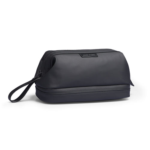 Mark Ryden Global black toiletry bag with wrist strap for modern travelers