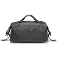Mark Ryden AquaCube 3D waterproof organizer cube in charcoal gray with top handle and adjustable side straps for packing.