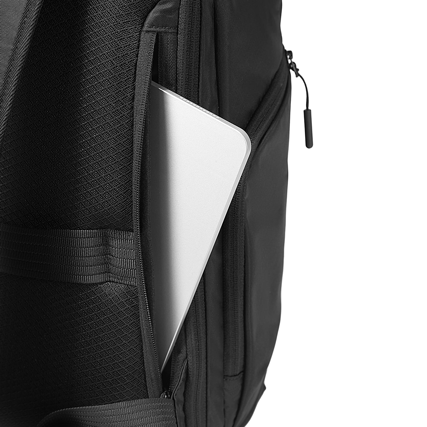 Black anti-theft MorphCore backpack with laptop in zippered pocket for modern travelers