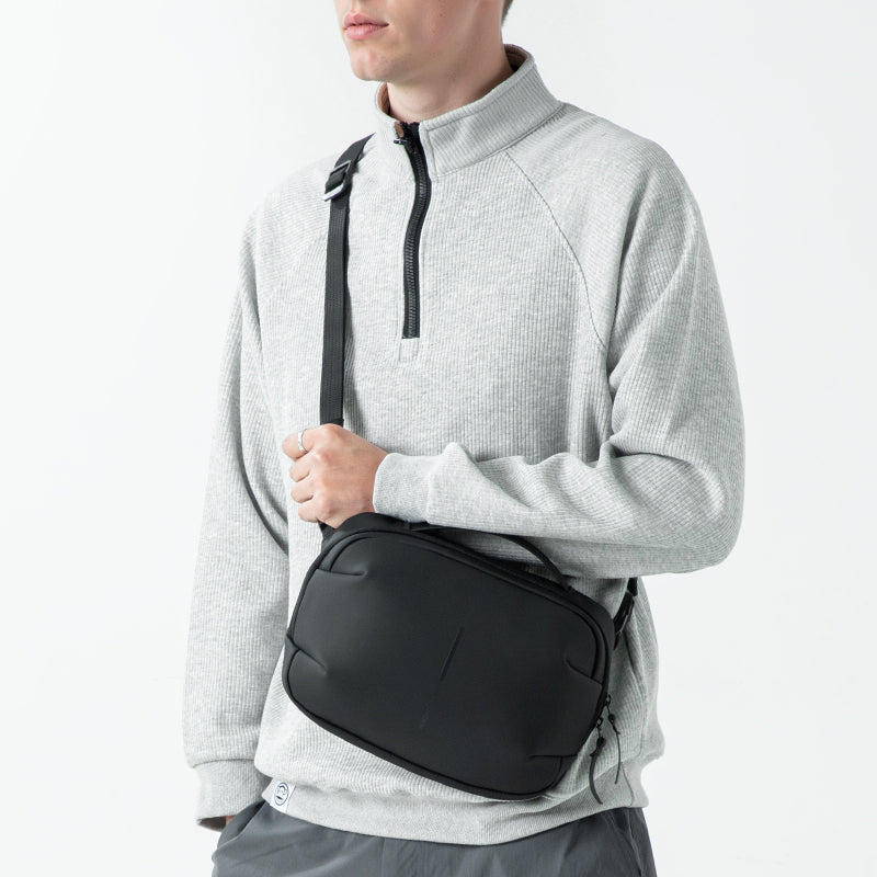 AquaLite waterproof PU leather sling bag modern daily