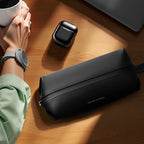 Mark Ryden Global Switchstorage VI lightweight black PU toiletry bag on wooden desk