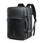 Mark Ryden Global smart-compression travel backpack for frequent flyers - sleek black design with multiple compartments and buckles
