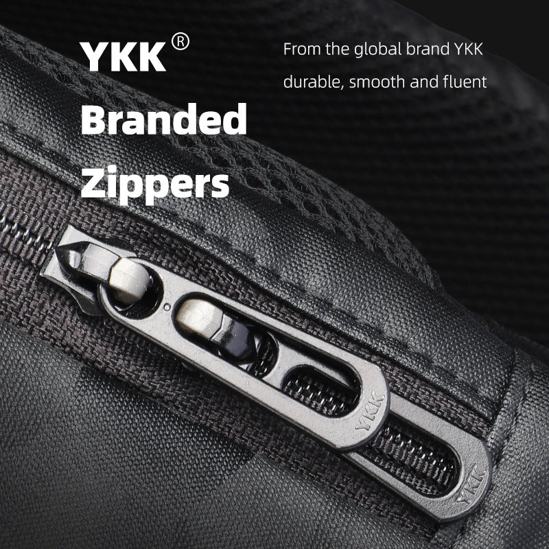 Close-up of YKK branded metallic zippers on black tactical commuter backpack, showcasing durable and smooth functionality for urban use.