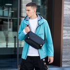 MarkRyden waterproof multifunction messenger bag in black, modern urban setting