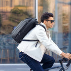 MarkRyden Global Transforma expandable backpack on cyclist